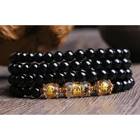 108 szemes buddhista vésett kristály mala karkötő