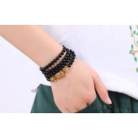 108 szemes buddhista vésett kristály mala karkötő