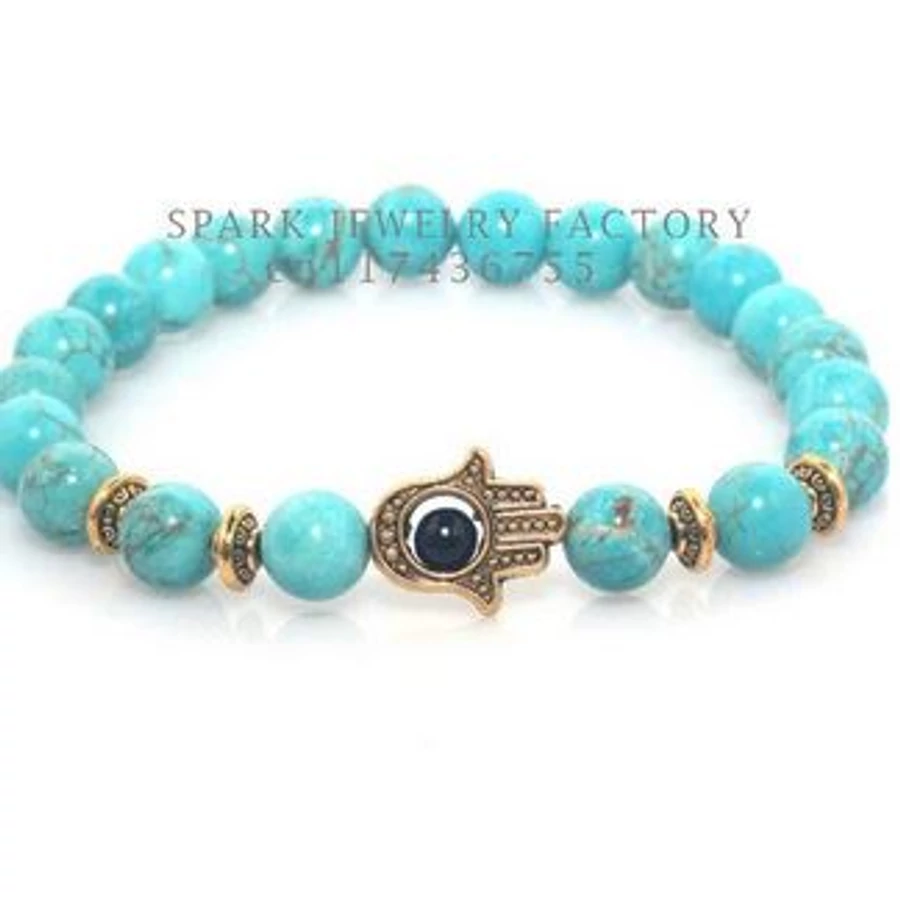 Fatima keze arany színű medállal, türkiz színű gyöngy karkötő